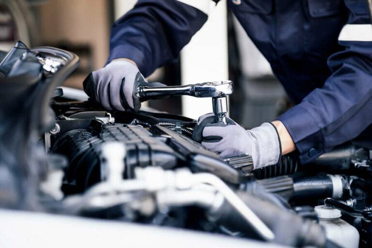 mechanic working on engine